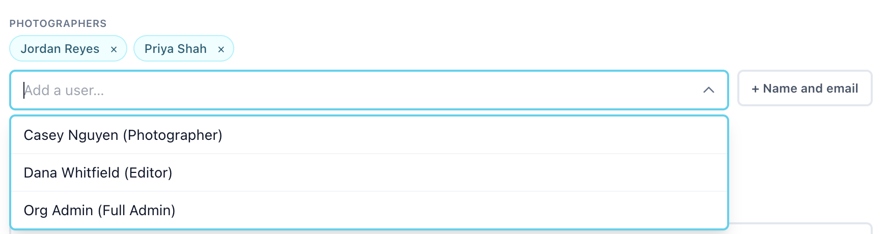 Photographers field with two chips added and the user list open